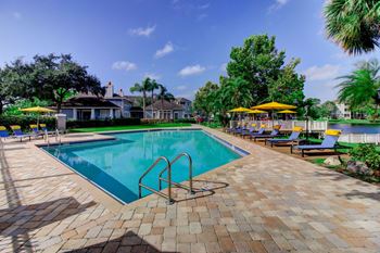 Swimming Pool with Sun Deck and Ample Comfortable Lounging at Berkshires at Citrus Park, Tampa, FL 33625